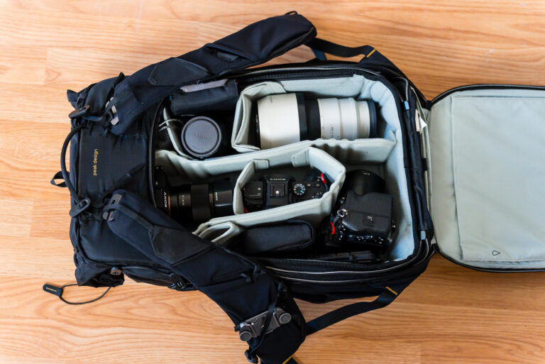professional photography equipment packed in a camera backpack